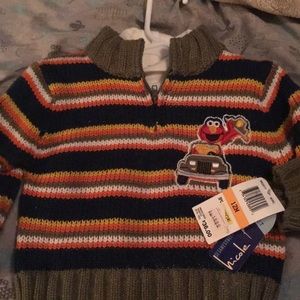 Elmo sweater and under shirt. Never worn.